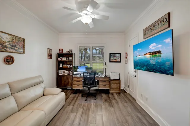 a bathroom with a tub sink shower and mirror