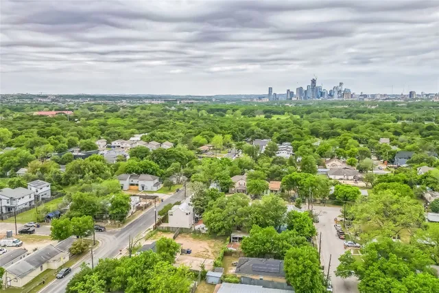 an aerial view of residential house with outdoor space