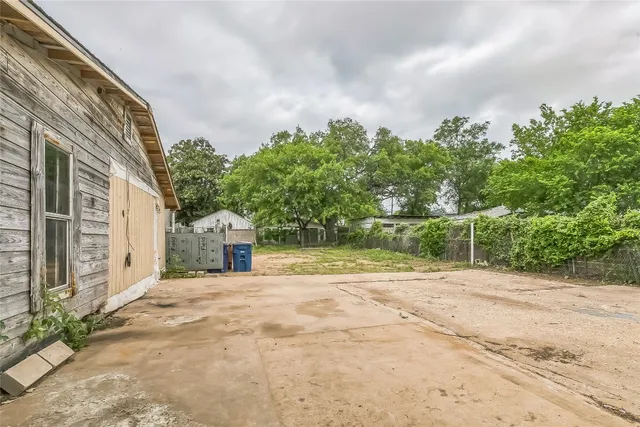 a view of a backyard of a house