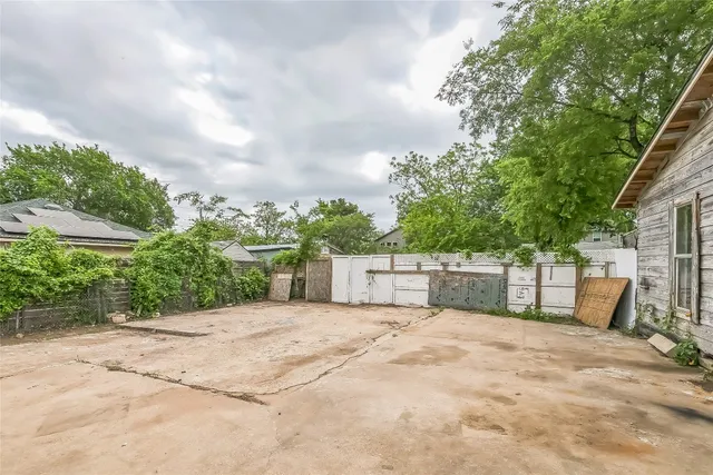 a view of a chair and tables on the house