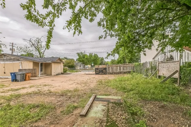 a house view with a garden space
