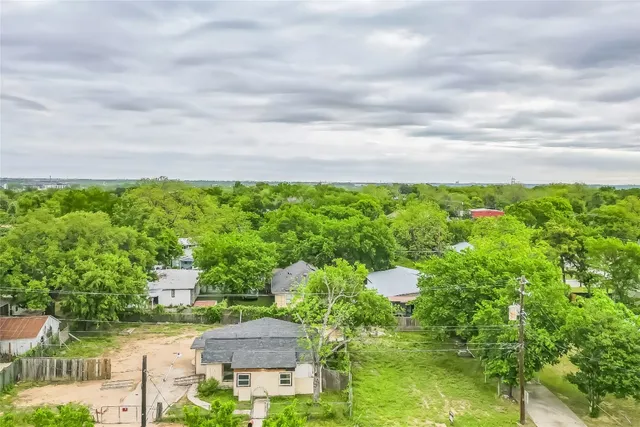 a view of a garden with an outdoor space