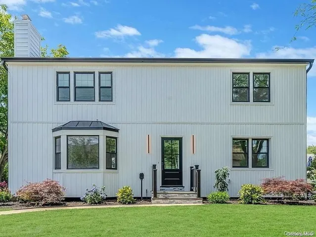 front view of house with a yard
