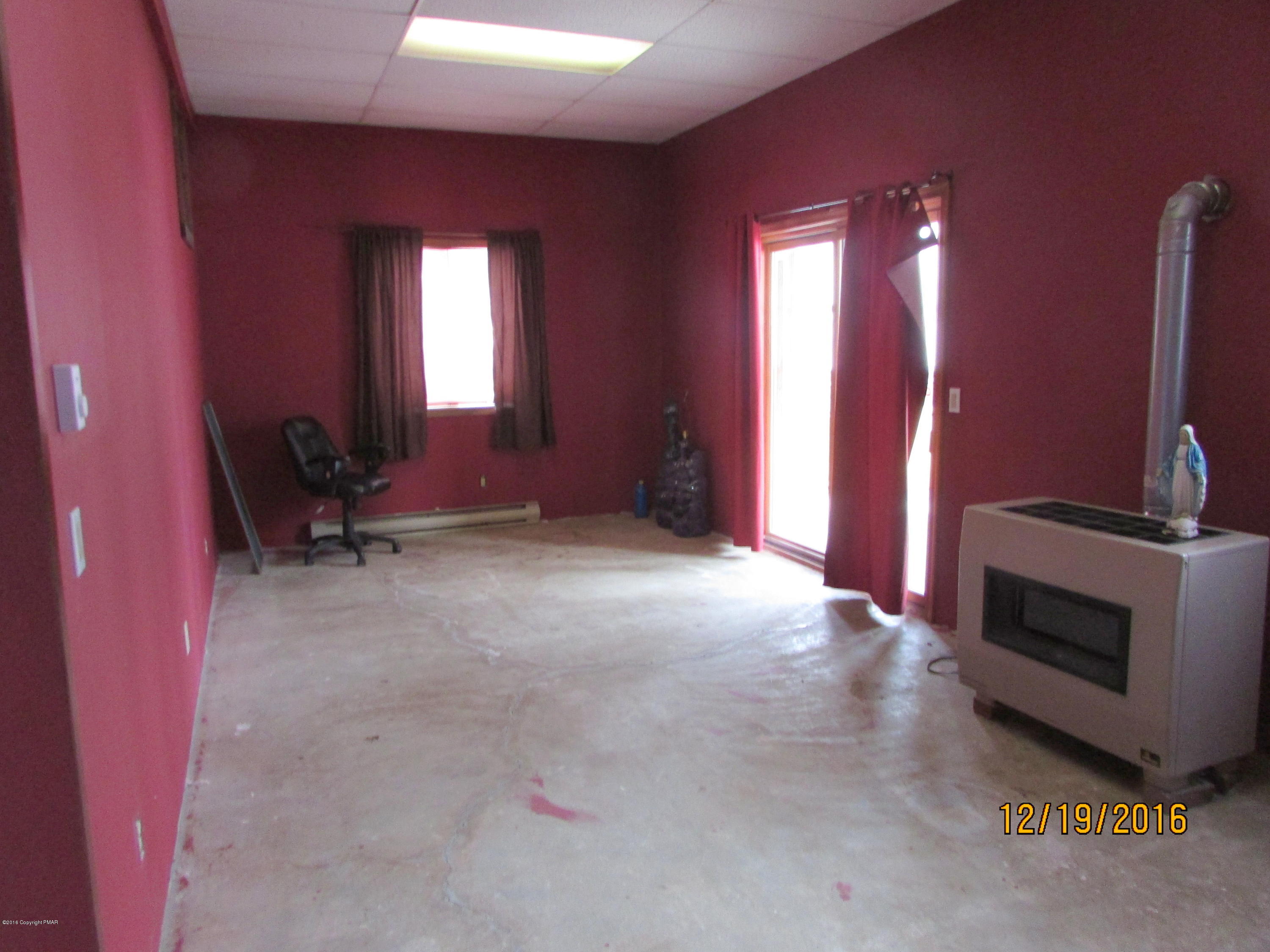181 Doe Loop Bushkill, PA 18324 - Photo 29 of 34 181 Doe Loop Unfinished Family room