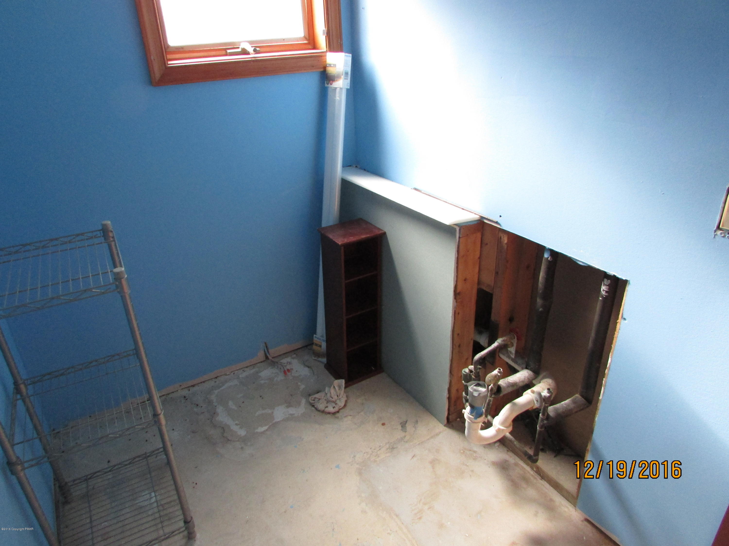 181 Doe Loop Bushkill, PA 18324 - Photo 30 of 34 181 Doe Loop unfinished plumbed bathroom