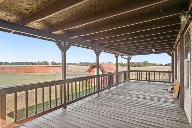 a view of lake with green space