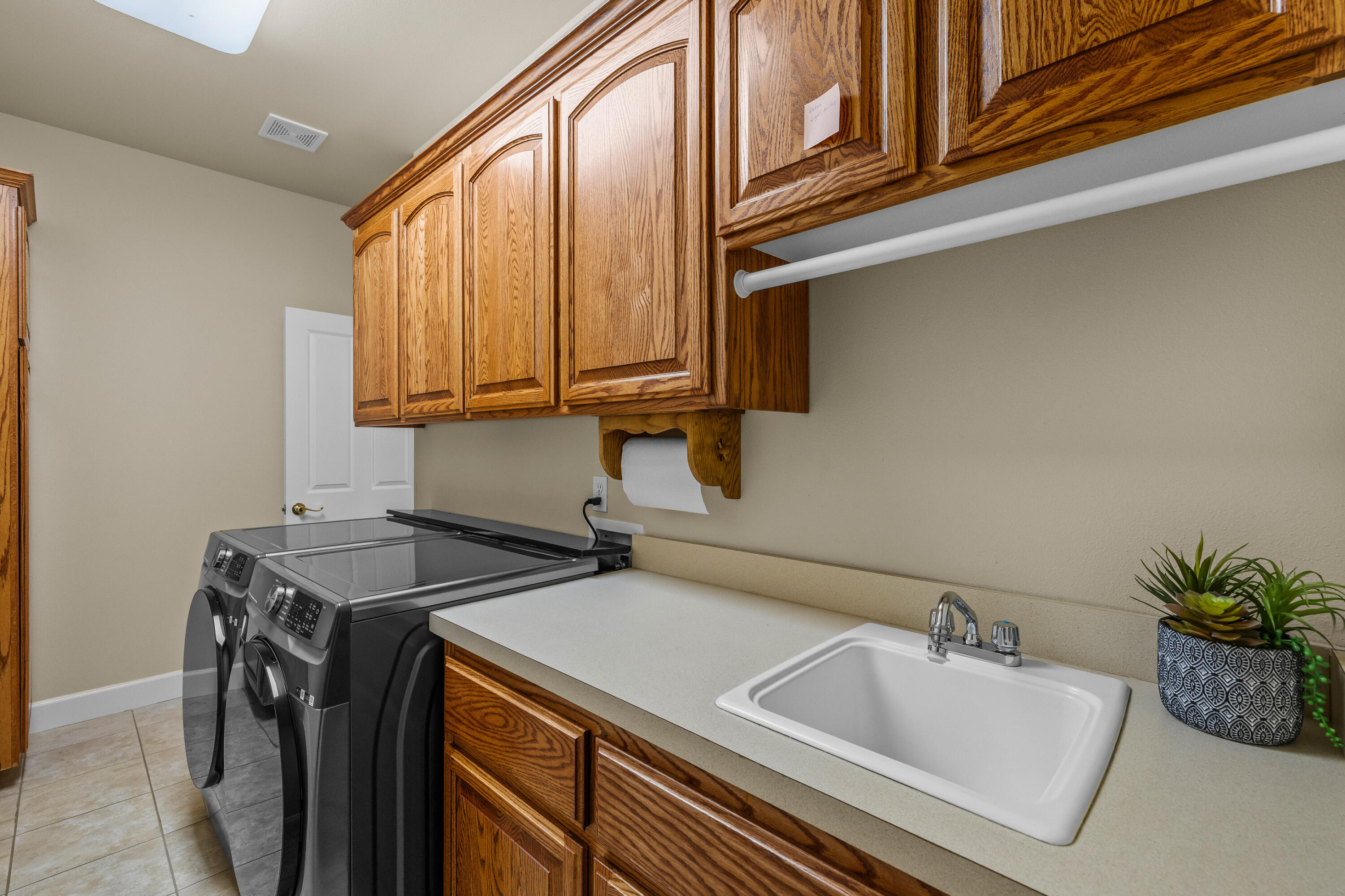 19598 Green Lakes Loop Bend, OR 97702 - Photo 25 of 89 a utility room with dryer and washer