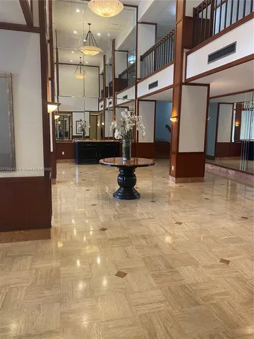 a view of kitchen with furniture and window