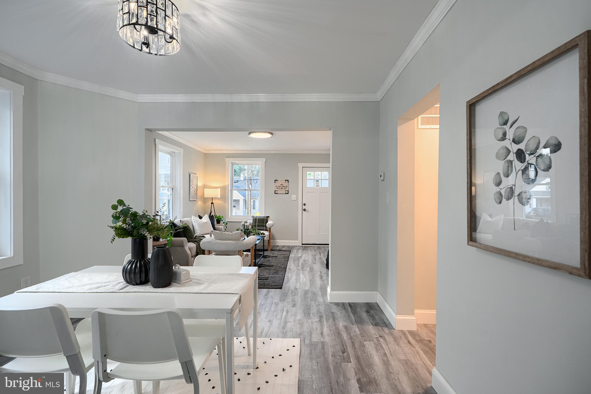 2919 Onyx Road Baltimore, MD 21234 - Photo 11 of 41 a view of a dining room with furniture window and wooden floor