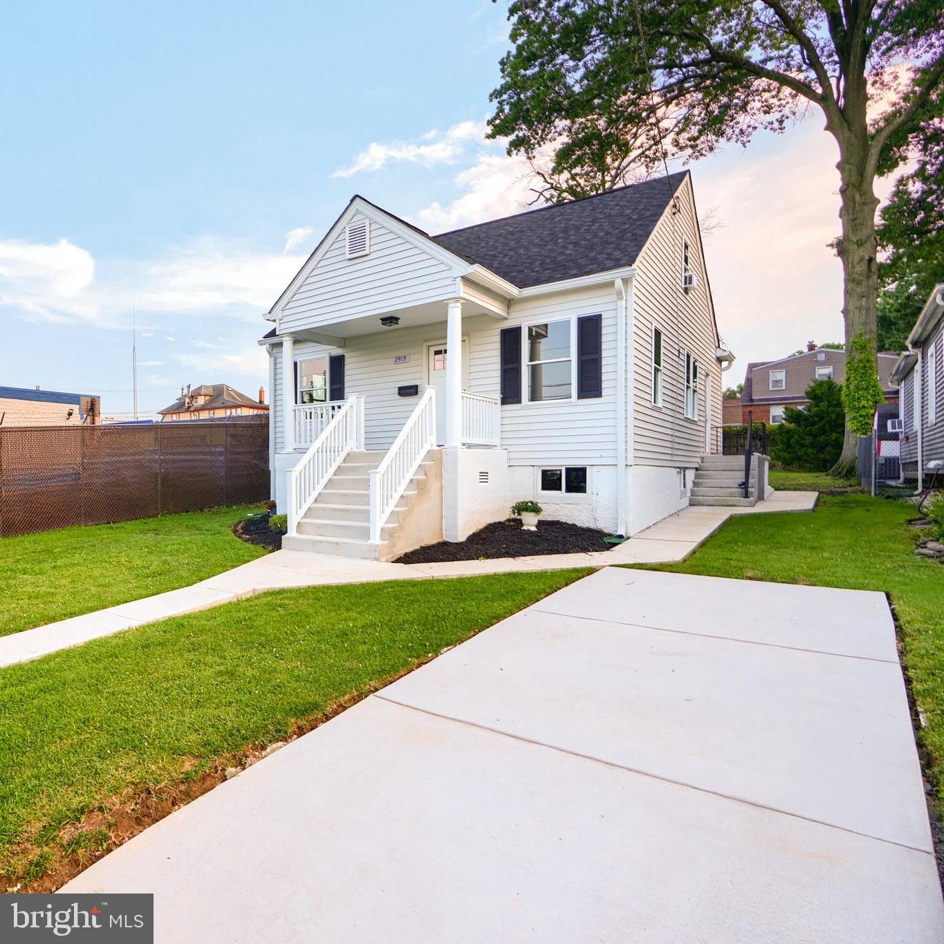 2919 Onyx Road Baltimore, MD 21234 - Photo 3 of 41 a front view of house with yard and green space