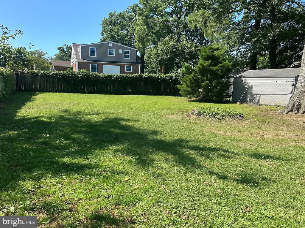 2919 Onyx Road Baltimore, MD 21234 - Photo 40 of 41 a view of a house with a yard