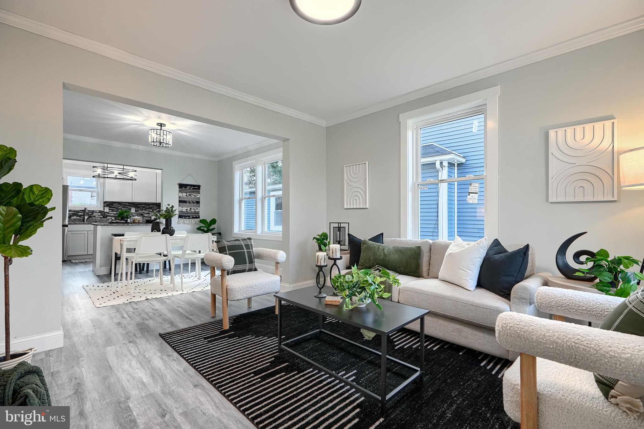 2919 Onyx Road Baltimore, MD 21234 - Photo 4 of 41 a living room with furniture or couch and a kitchen