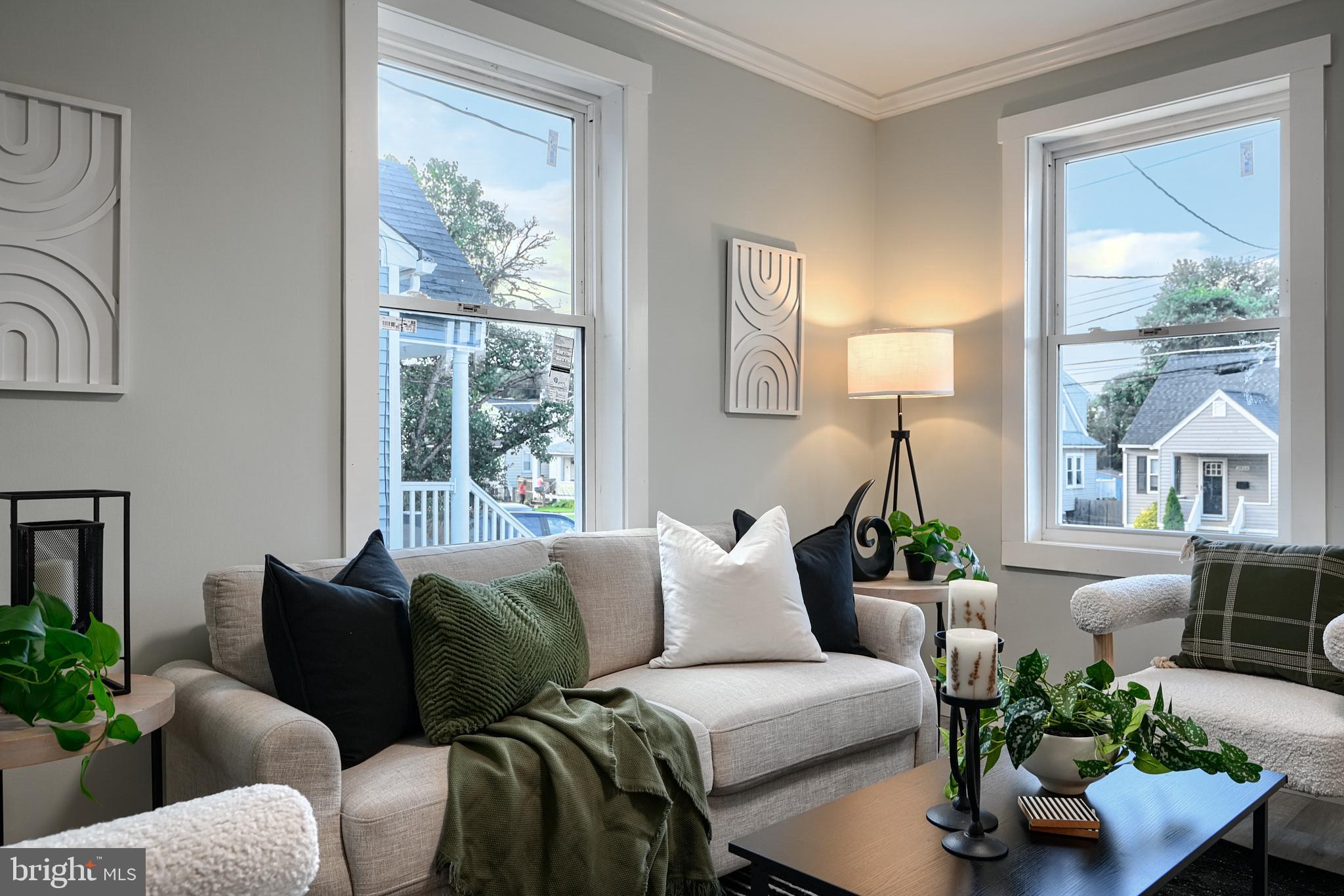 2919 Onyx Road Baltimore, MD 21234 - Photo 6 of 41 a living room with furniture and a large window