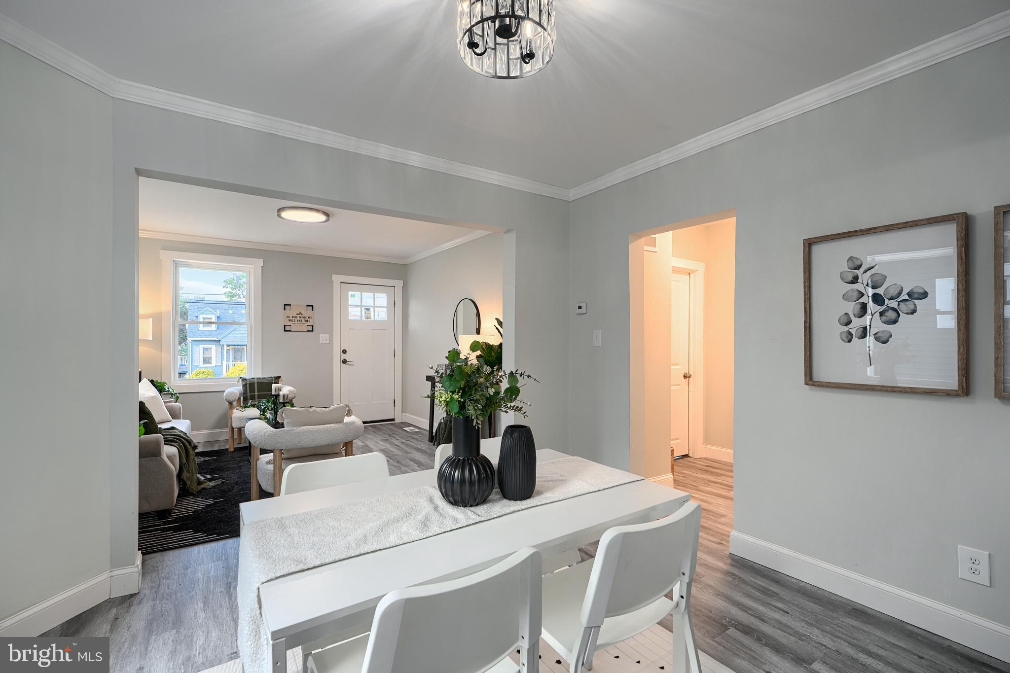 2919 Onyx Road Baltimore, MD 21234 - Photo 10 of 41 a view of a dining room with furniture window and flowerpot