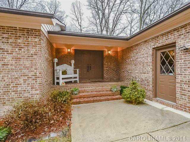 1611 Little Rock Road Charlotte, NC 28214 - Photo 2 of 16 a front view of a house with a yard