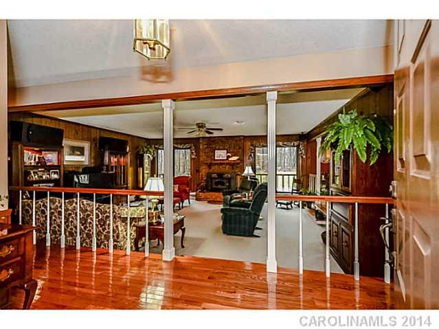 1611 Little Rock Road Charlotte, NC 28214 - Photo 3 of 16 a view of a patio with dining table and chairs