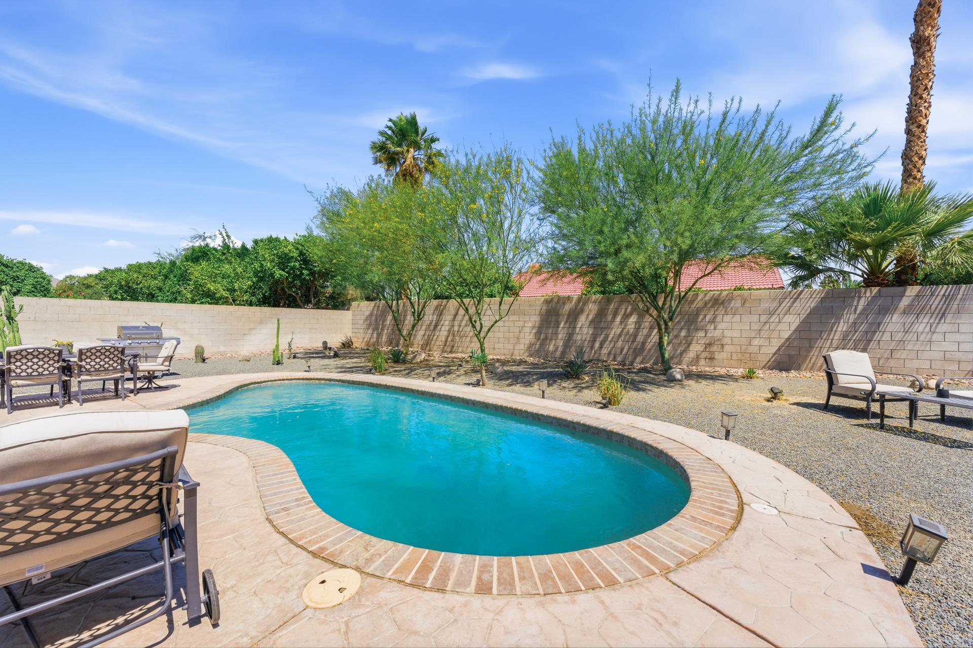 67220 Quijo Road Cathedral City, CA 92234 - Photo 3 of 26 a view of outdoor space and swimming pool