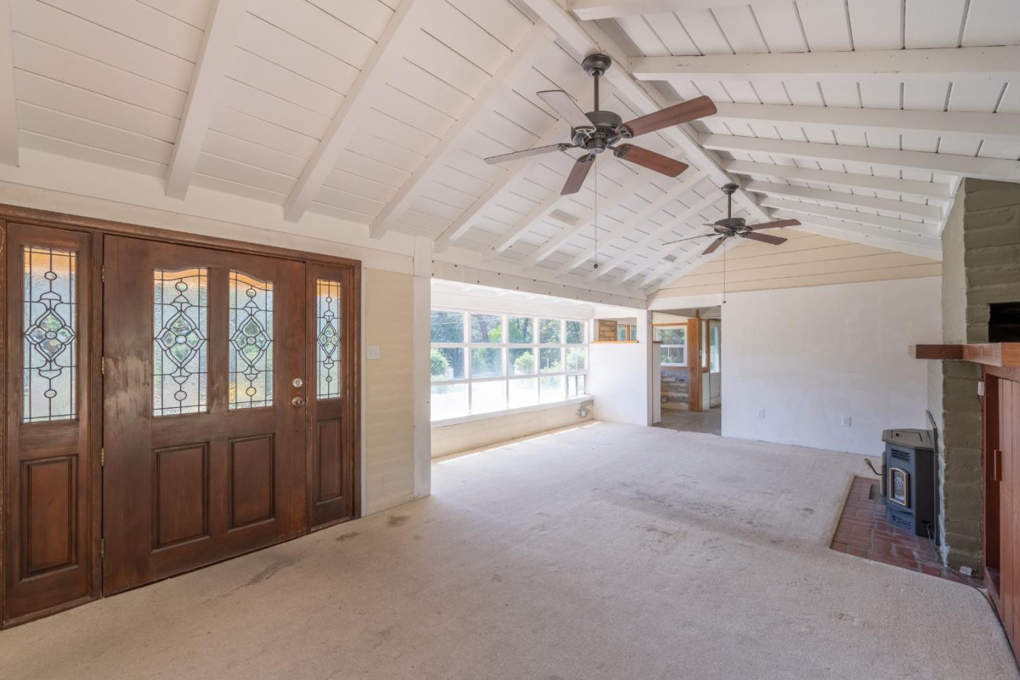 72 Los Laureles Grade Road Carmel Valley, CA 93924 - Photo 3 of 43 a view of an empty room with a window