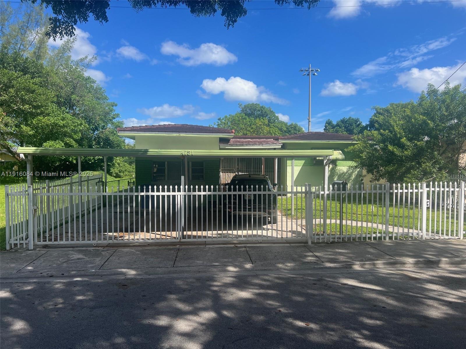 4751 Northwest 15th Avenue Miami, FL 33142 - Photo 2 of 10 a view of a house with a street view