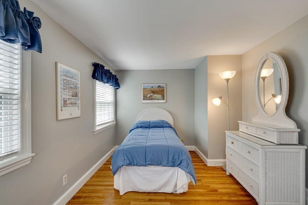 35 Meadowbrook Road Needham, MA 02492 - Photo 21 of 32 a living room with furniture and a wooden floor