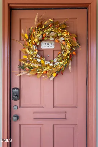 a picture of a bench in front of a wall