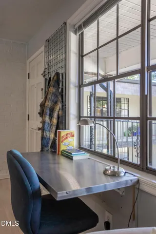 a view of kitchen with a dining table chairs