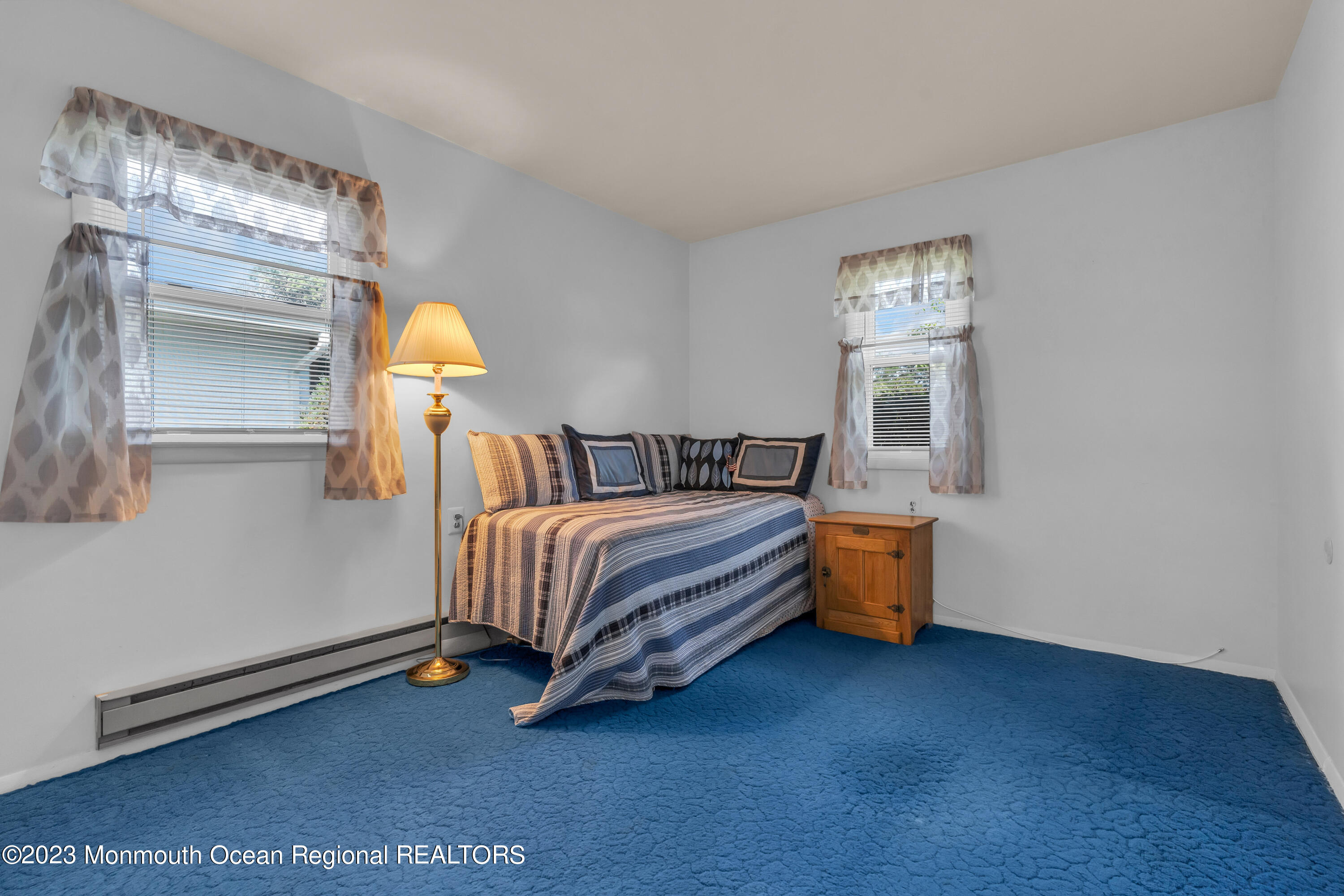 21 Blake Circle Brick, NJ 08724 - Photo 16 of 23 a bedroom with a bed and a window