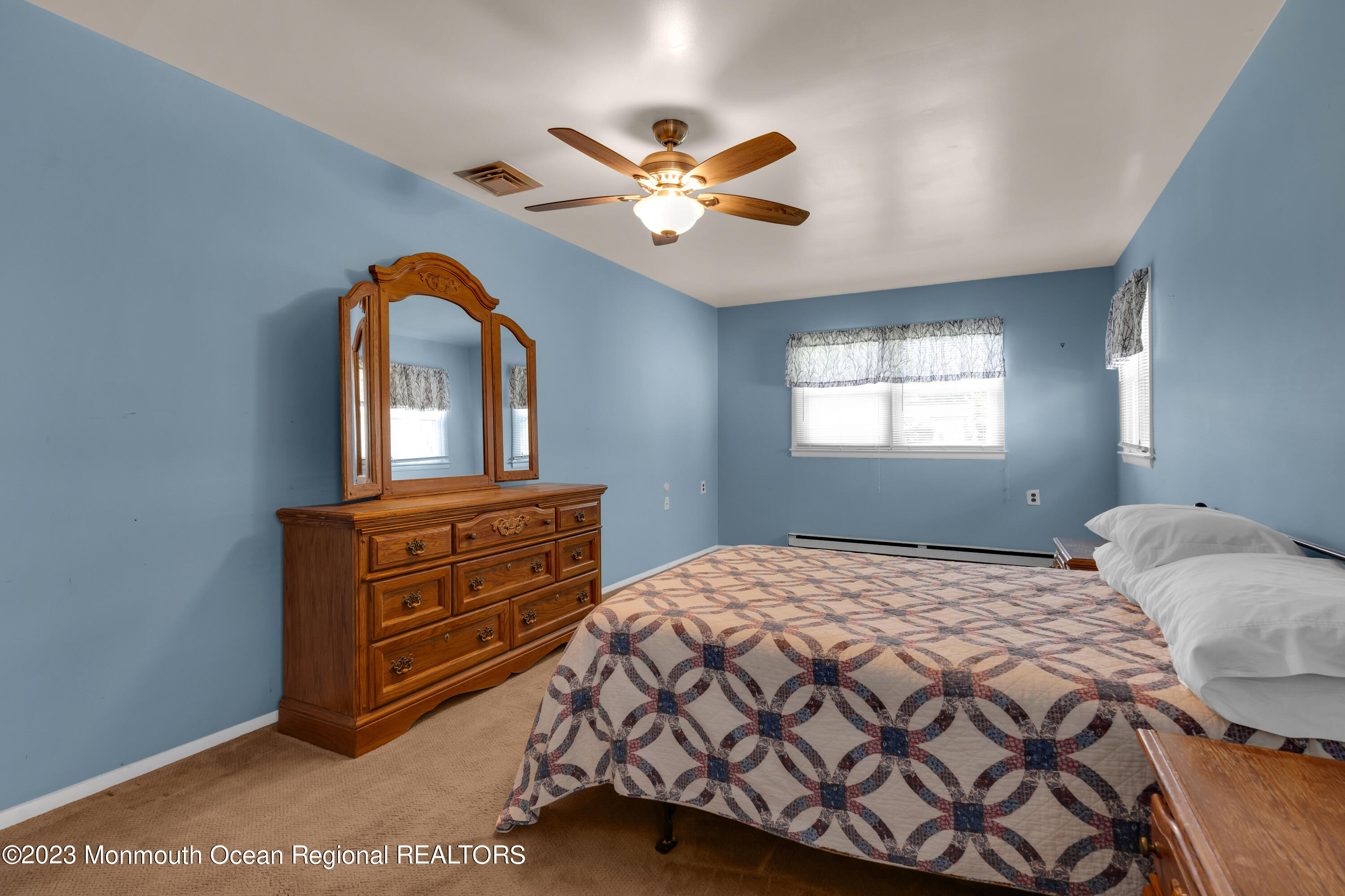 21 Blake Circle Brick, NJ 08724 - Photo 19 of 23 a bedroom with a bed and a dresser