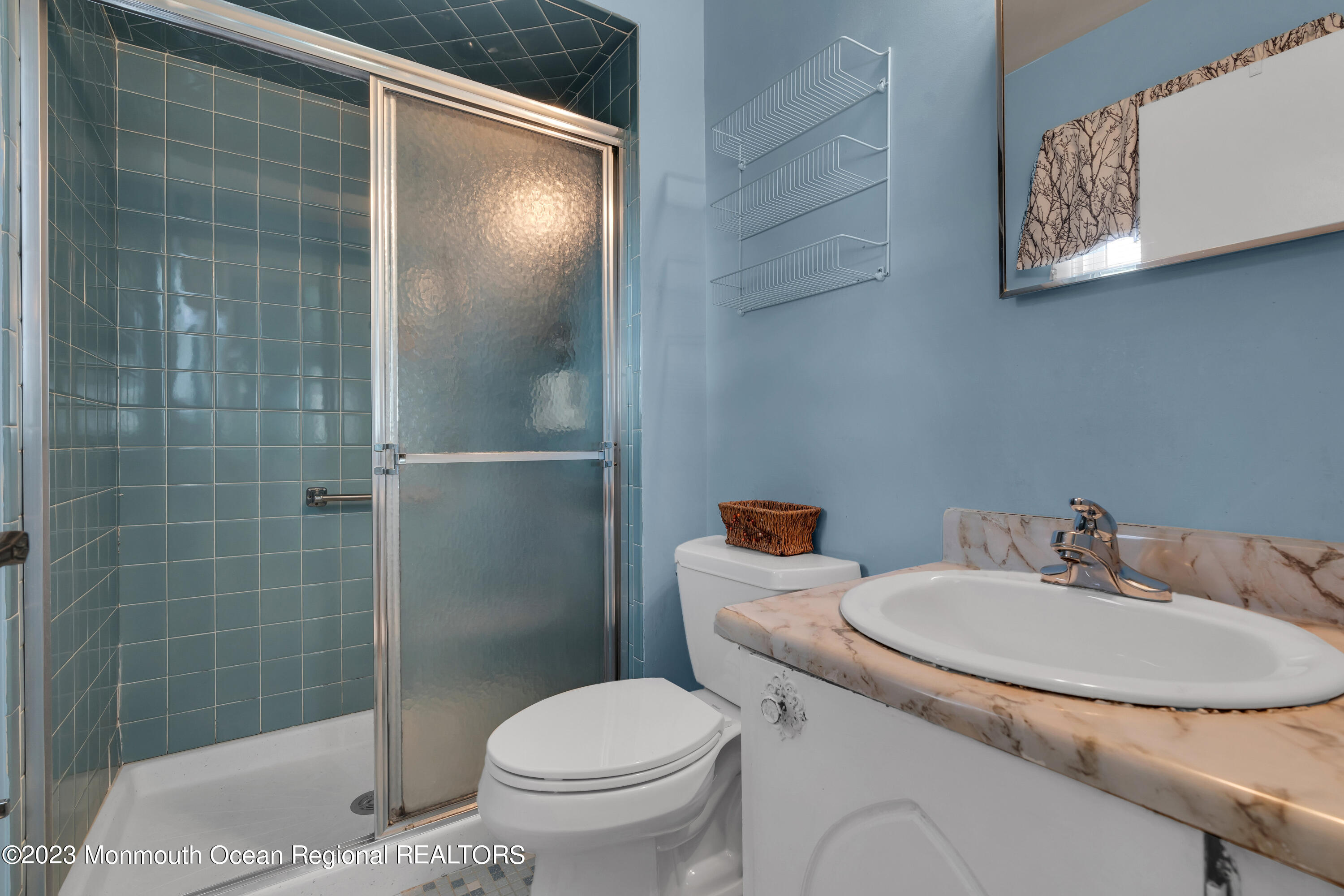 21 Blake Circle Brick, NJ 08724 - Photo 20 of 23 a bathroom with a sink toilet and shower