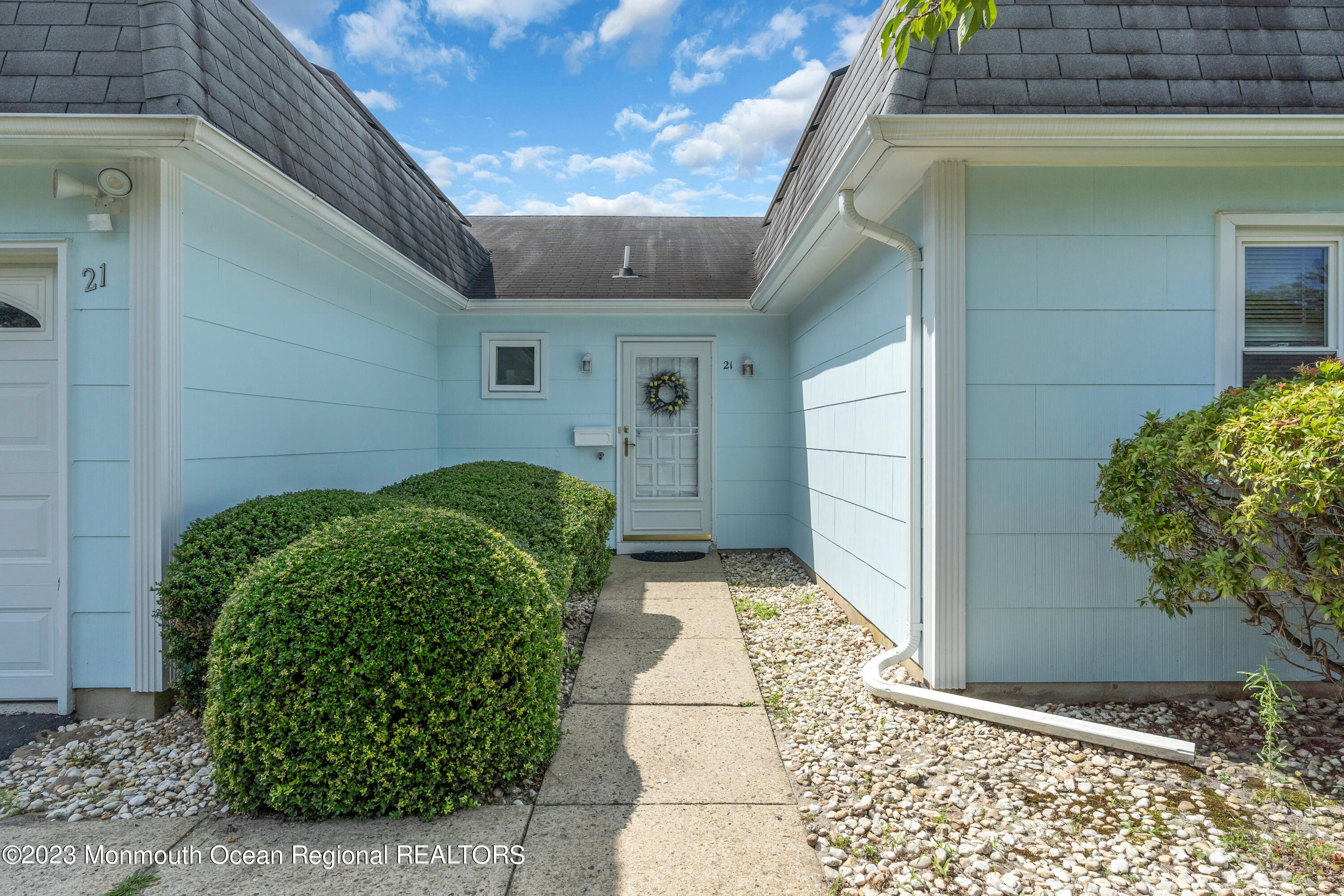 21 Blake Circle Brick, NJ 08724 - Photo 5 of 23 a view of a back yard of the house