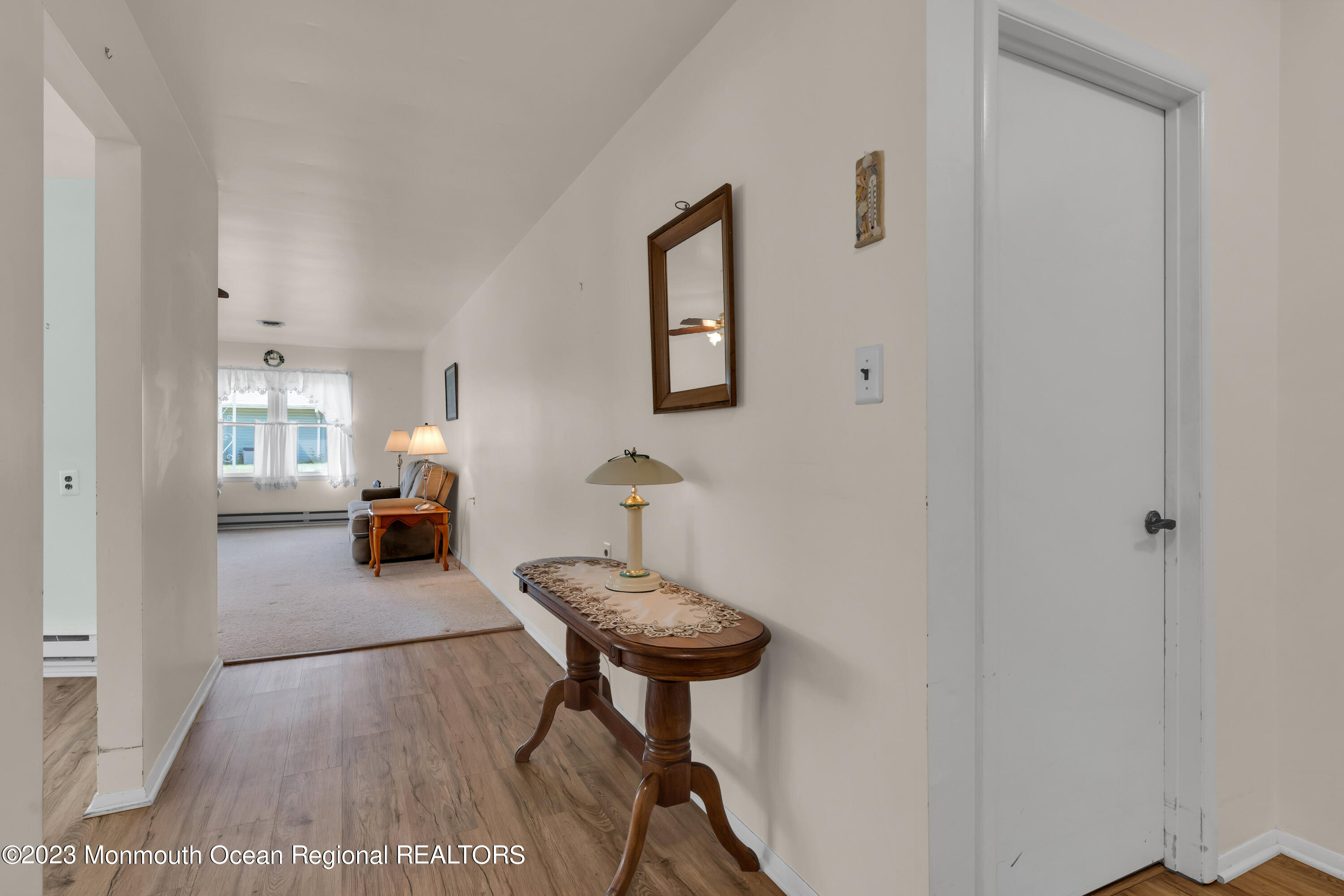 21 Blake Circle Brick, NJ 08724 - Photo 7 of 23 a view of a livingroom with furniture and a window