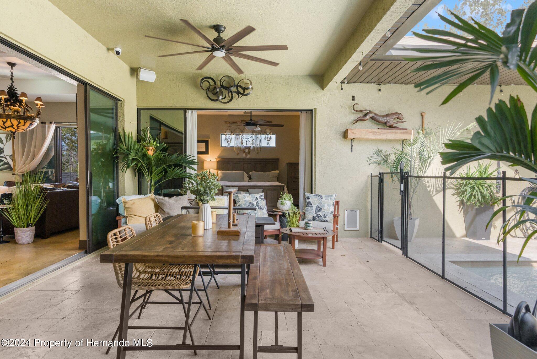 8075 Delaware Weeki Wachee, FL 34607 - Photo 54 of 96 a view of a dining room with furniture