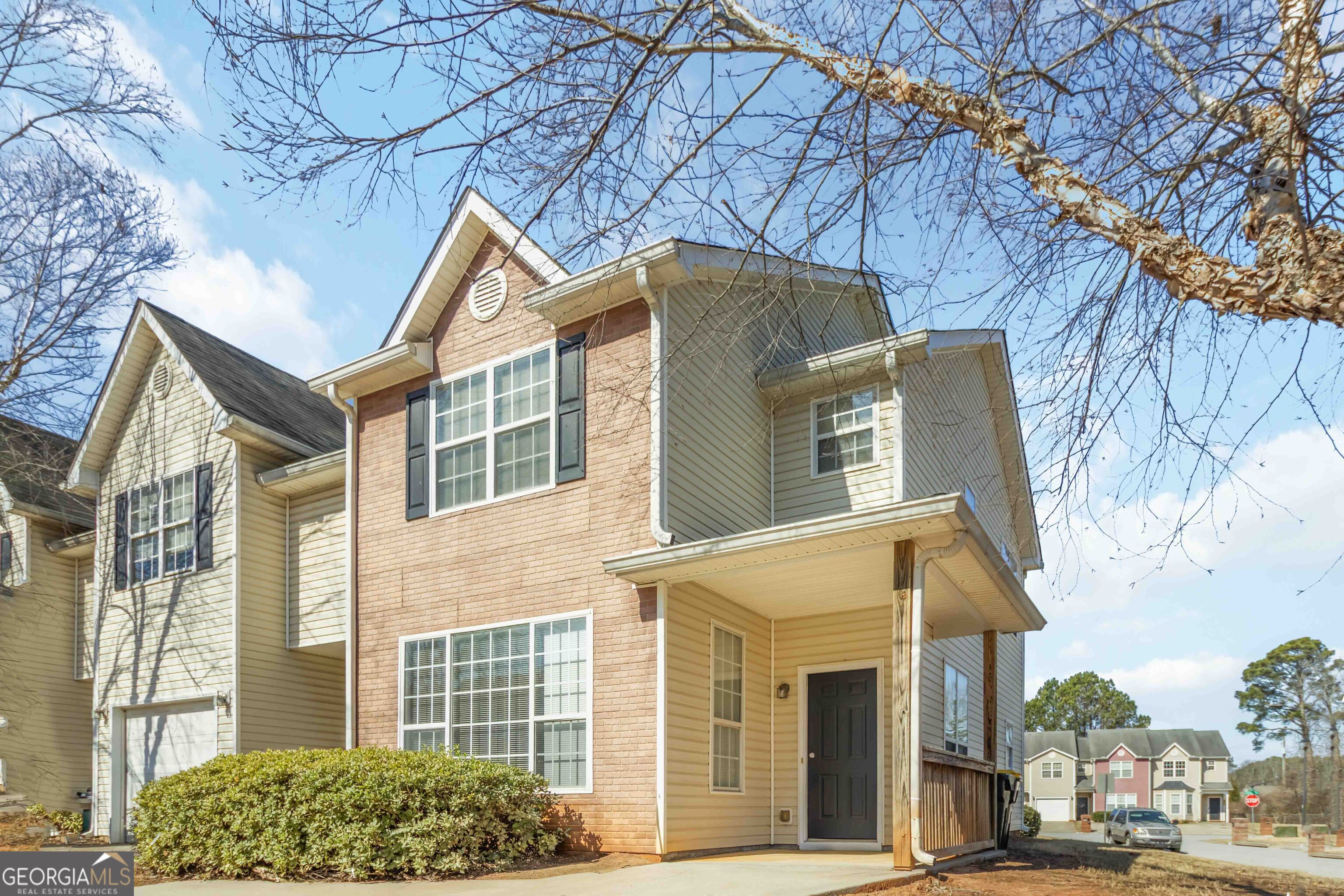 11307 Michelle Way Hampton, GA 30228 - Photo 3 of 30 a view of a house with a yard and garage