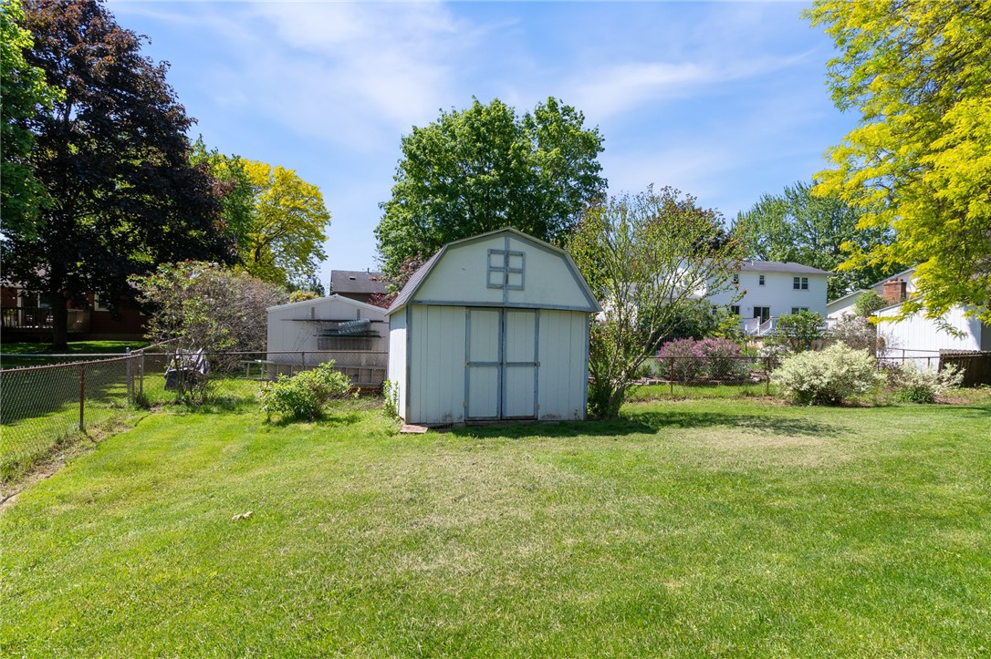 25 Spring Tree Lane Greece, NY 14612 - Photo 37 of 40 There’s even a shed for more storage!