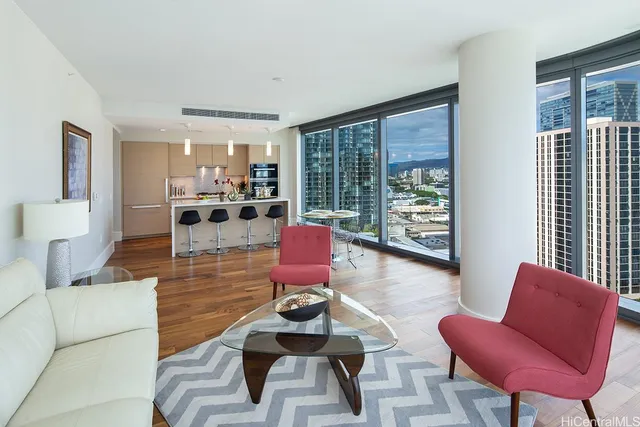 a living room with furniture and a large window