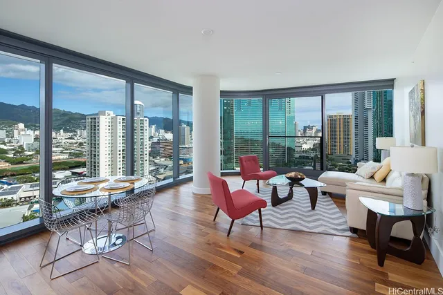 a living room with furniture and a large window