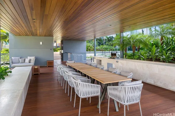 a outdoor dining space with furniture and outdoor space