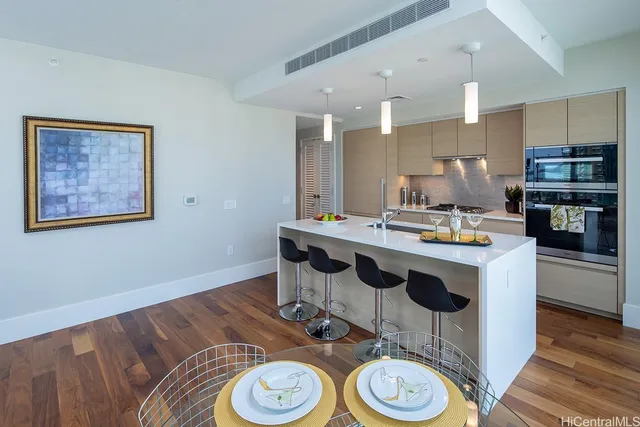 a kitchen with a appliances and cabinets