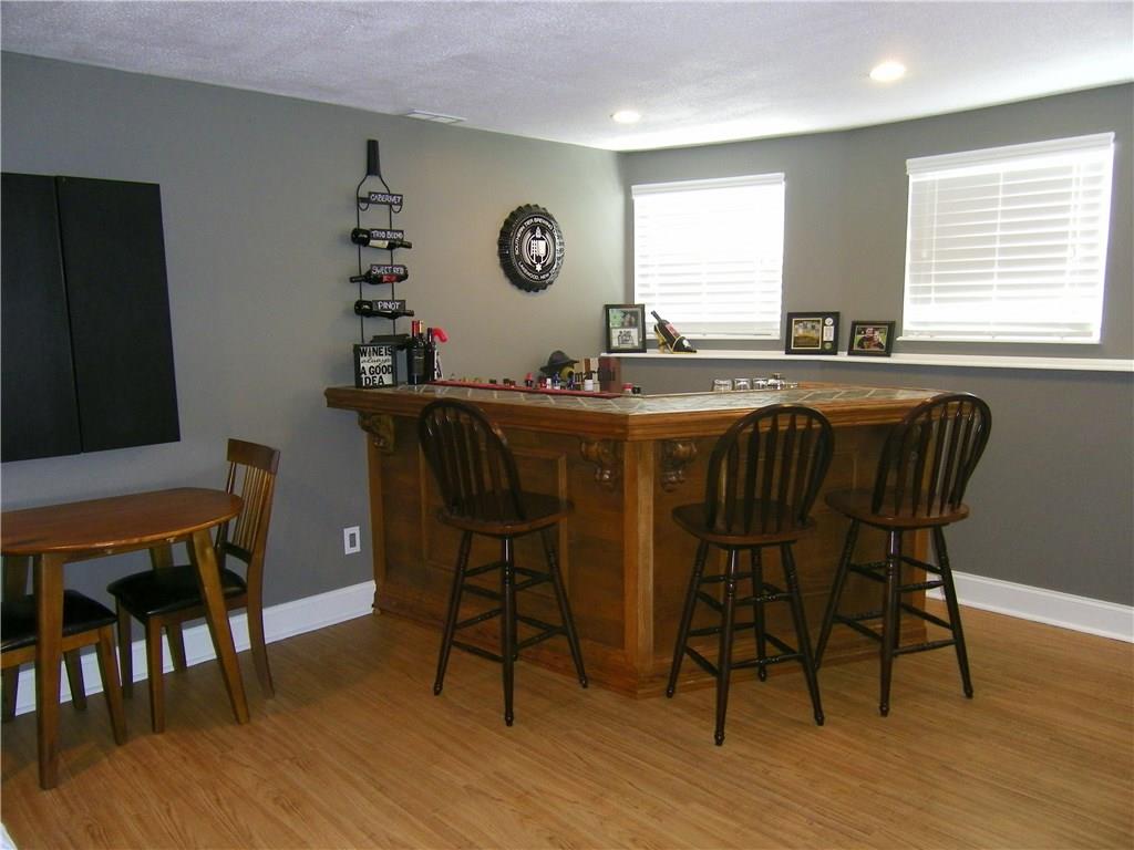 203 Commodore Drive McDonald, PA 15057 - Photo 16 of 24 Lower level bar with stools is great for get-togethers!