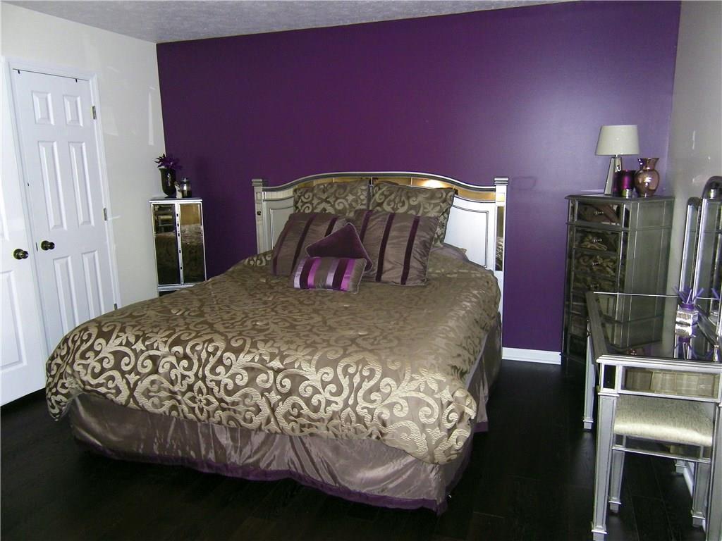 203 Commodore Drive McDonald, PA 15057 - Photo 9 of 24 Master bedroom with large closet, Pergo flooring, and master bath