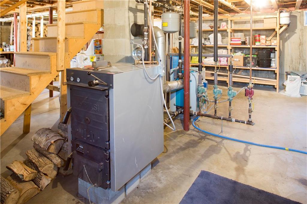 177 Merrill Road Stetson, ME 04488 - Photo 22 of 28 Biasi wood boiler works in...