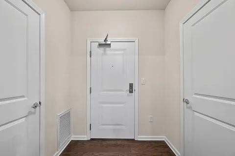 a view of a building with sitting area