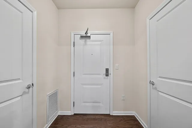 a view of a building with sitting area