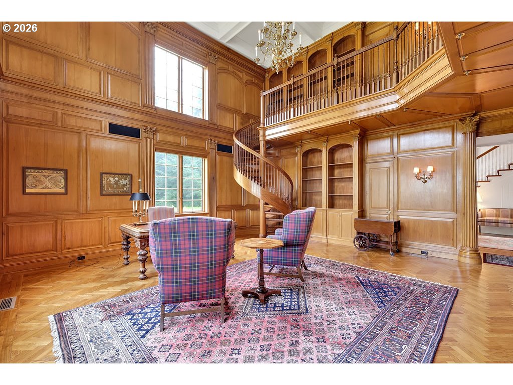 5255 Salal Court Florence, OR 97439 - Photo 17 of 46 a dining room with furniture a rug and wooden floor