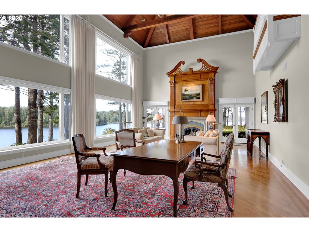 5255 Salal Court Florence, OR 97439 - Photo 21 of 46 a view of a dining room with furniture window and outside view