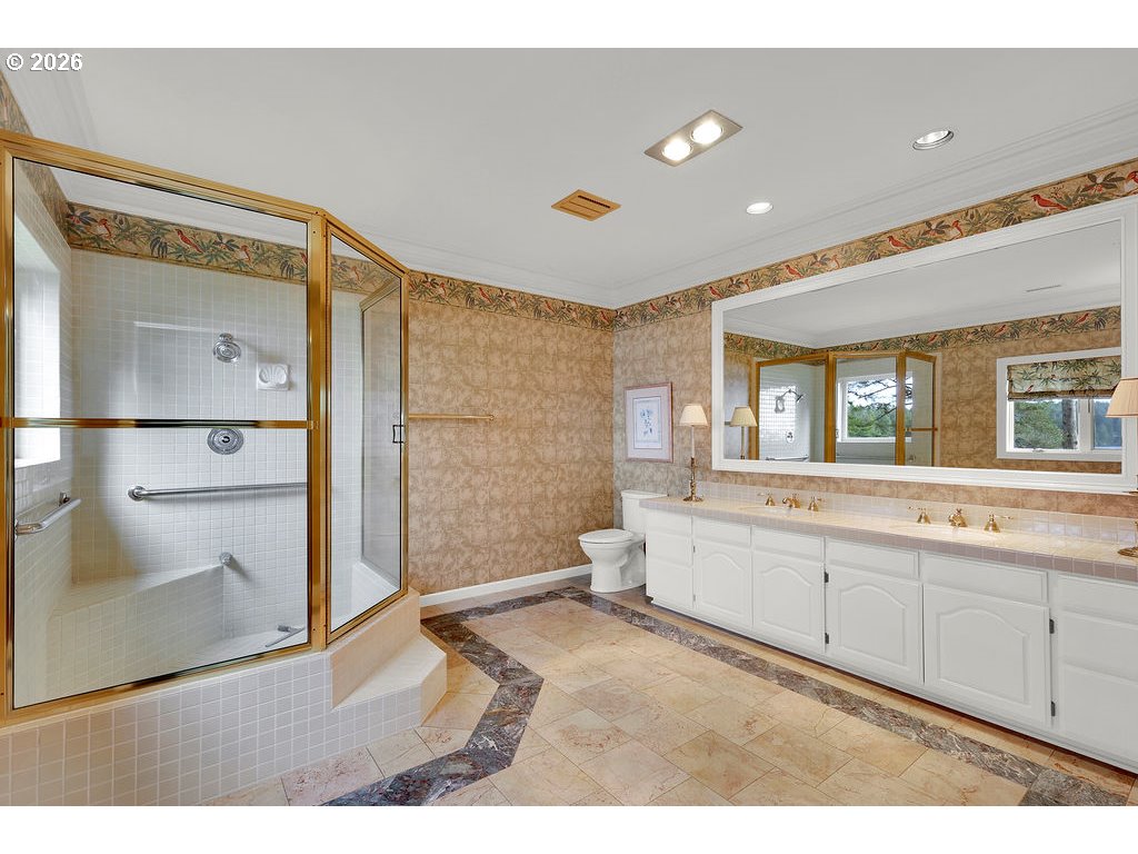 5255 Salal Court Florence, OR 97439 - Photo 32 of 46 a bathroom with a sink mirror and a bath tub