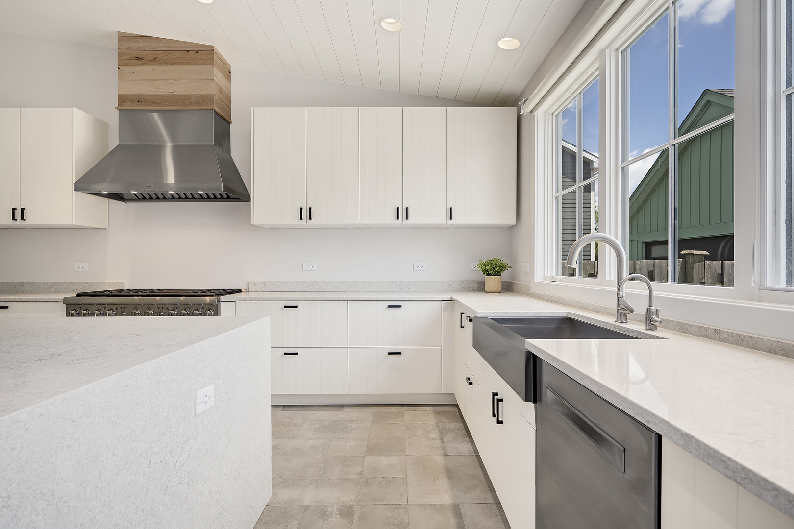 4333 Roslyn Road Downers Grove, IL 60515 - Photo 13 of 67 a kitchen with stainless steel appliances white cabinets and a sink