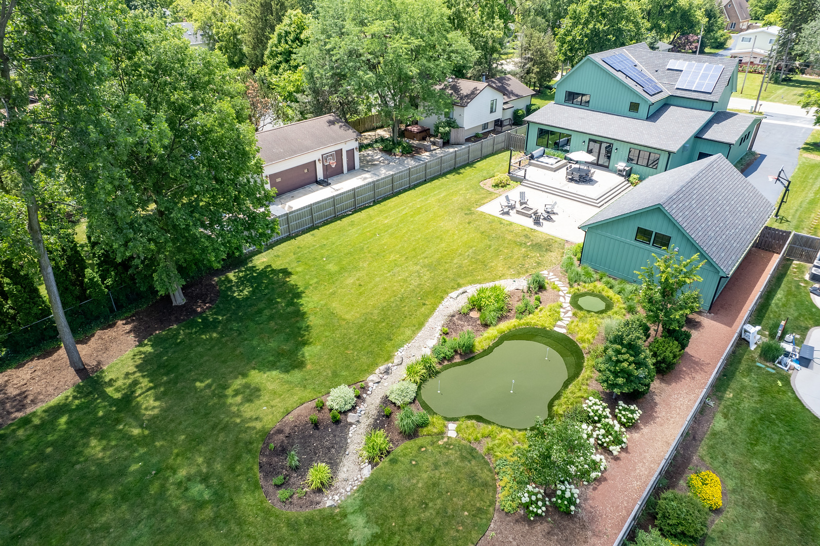 4333 Roslyn Road Downers Grove, IL 60515 - Photo 2 of 67 an aerial view of a house with a garden and swimming pool