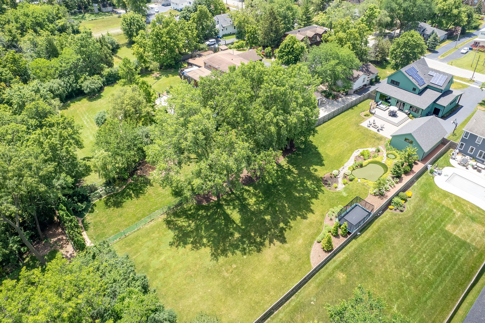 4333 Roslyn Road Downers Grove, IL 60515 - Photo 57 of 67 an aerial view of residential houses with outdoor space and swimming pool
