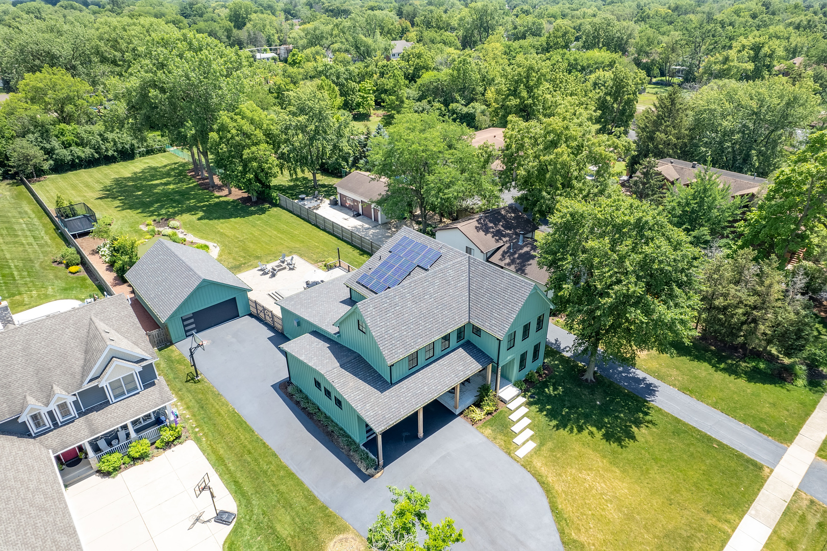 4333 Roslyn Road Downers Grove, IL 60515 - Photo 60 of 67 an aerial view of a house with a garden and swimming pool